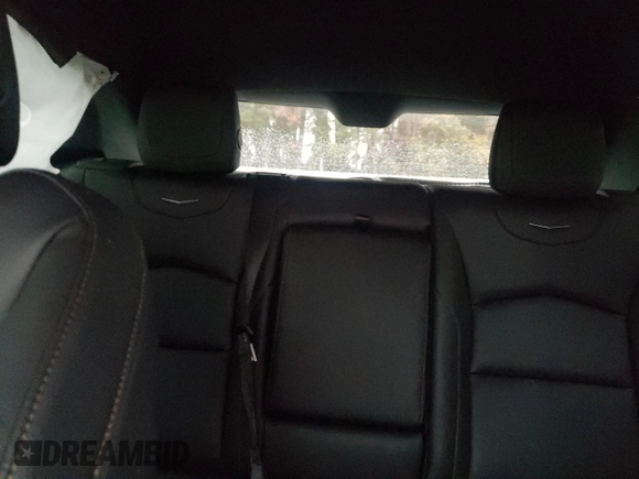 2022 Cadillac XT4 FWD Sport with VIN 1GYFZER43NF108145, listed as a Copart auction lot 83984054 with 36,603 mi miles and Salvage title. Bid and sale history available at DreamBid. Image 10.