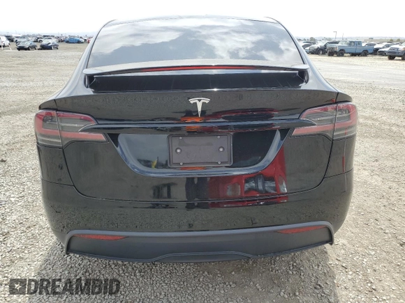 2022 Tesla Model X with VIN 7SAXCDE59NF360610, listed as a Copart auction lot 52575365 with 51,557 mi miles and Salvage Title. Bid and sale history available at carsss.com. Image 6.