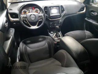 2015 Jeep Cherokee Latitude z VIN 1C4PJMCS9FW750275, wystawiony jako Copart lot #64191695 z przebiegiem 130 818 mil mil oraz Szkoda całkowita • Salvage title. Historia ofert i sprzedaży dostępna na DreamBid. Obrazek 8.