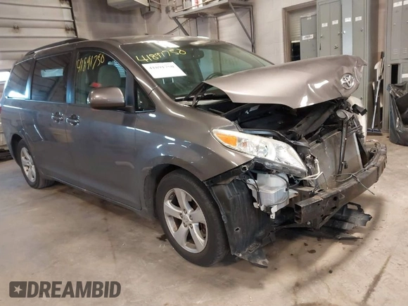 2015 Toyota Sienna LE AAS with VIN 5TDKK3DC6FS652281, listed as a IAAI auction lot 41891750 with 150,162 mi miles. Bid and sale history available at carsss.com. Image 1.