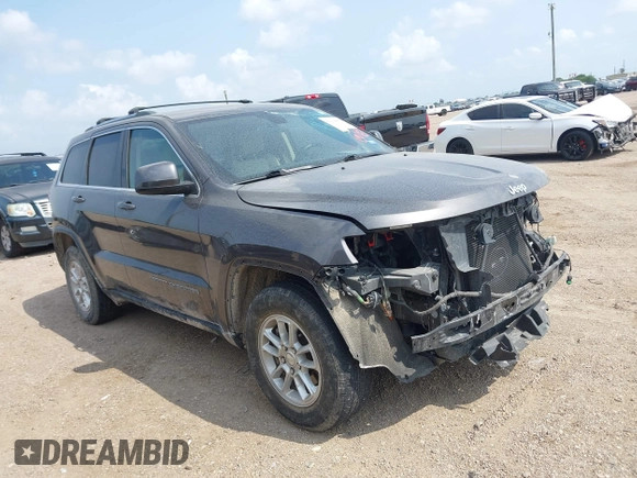 2020 Jeep Grand Cherokee Laredo E with VIN 1C4RJEAG2LC284912, listed as a IAAI auction lot 42114881 with 86,579 mi miles and . Bid and sale history available at DreamBid. Image 14.