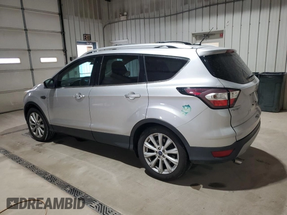 2017 Ford Escape Titanium with VIN 1FMCU9JD9HUC58945, listed as a Copart auction lot 52341485 with 31,074 mi miles and Salvage Title. Bid and sale history available at carsss.com. Image 2.