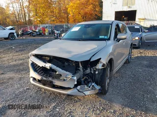 2024 Mazda CX-5 2.5 S Premium Package with VIN JM3KFBDL7R0470375, listed as a IAAI auction lot 40657155 with 8,584 mi miles. Bid and sale history available at carsss.com. Image 6.