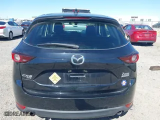2017 Mazda CX-5 Sport with VIN JM3KFBBL2H0144792, listed as a IAAI auction lot 41654031 with 77,107 mi miles. Bid and sale history available at carsss.com. Image 16.