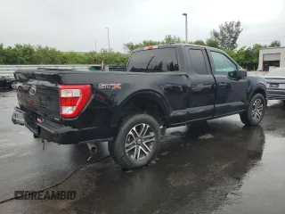 2023 Ford F-150 XL with VIN 1FTEX1CP4PKD57678, listed as a Copart auction lot 63735995 with 21,554 mi miles and Clean title. Bid and sale history available at DreamBid. Image 3.