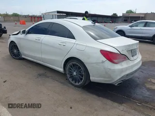 2014 Mercedes-Benz CLA 250 with VIN WDDSJ4GB0EN136231, listed as a IAAI auction lot 42046182 with 94,729 mi miles and . Bid and sale history available at DreamBid. Image 3.