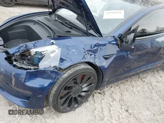 2021 Tesla Model 3 Performance with VIN 5YJ3E1EC6MF996743, listed as a IAAI auction lot 41509631 with 41,599 mi miles and . Bid and sale history available at DreamBid. Image 19.