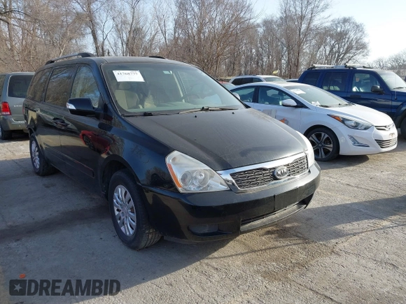 2011 Kia Sedona LX with VIN KNDMG4C70B6411556, listed as a IAAI auction lot 41768777 with 124,180 mi miles. Bid and sale history available at carsss.com. Image 1.