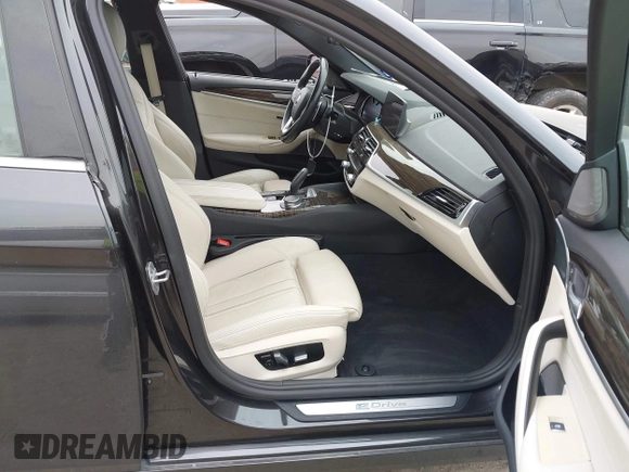 2018 BMW 5 Series 530e with VIN WBAJA9C55JB033575, listed as a IAAI auction lot 42067380 with 111,902 mi miles and . Bid and sale history available at DreamBid. Image 5.