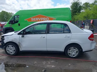 2010 Nissan Versa S with VIN 3N1BC1AP2AL409285, listed as a IAAI auction lot 42182721 with 266,855 mi miles and . Bid and sale history available at DreamBid. Image 14.