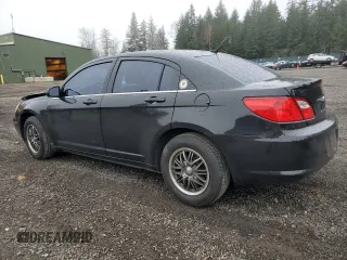 2010 Chrysler Sebring Touring with VIN 1C3CC4FB2AN229387, listed as a Copart auction lot 50753875 with 61,570 mi miles and Salvage Title. Bid and sale history available at DreamBid. Image 2.