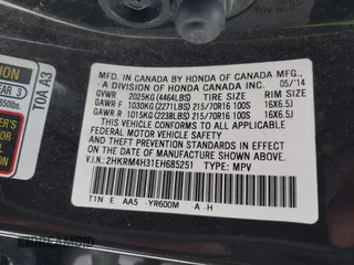 2014 Honda CR-V LX with VIN 2HKRM4H31EH685251, listed as a IAAI auction lot 41353619 with 125,793 mi miles and . Bid and sale history available at carsss.com. Image 9.