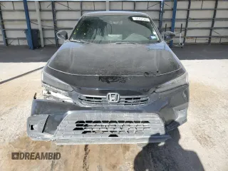 2023 Honda Civic Sedan Touring with VIN 2HGFE1F9XPH314303, listed as a Copart auction lot 50757585 with 32,924 mi miles and Clean Title. Bid and sale history available at carsss.com. Image 5.