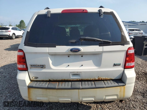 2012 Ford Escape XLT z VIN 1FMCU9DG8CKA54454, wystawiony jako Copart lot #63661675 z przebiegiem 123 759 mil mil oraz Czysty tytuł • Clean title. Historia ofert i sprzedaży dostępna na DreamBid. Obrazek 6.