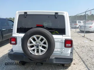 2023 Jeep Wrangler Willys z VIN 1C4HJXDG9PW545749, wystawiony jako IAAI lot #42307373 z przebiegiem 44 176 mil mil oraz . Historia ofert i sprzedaży dostępna na DreamBid. Obrazek 16.