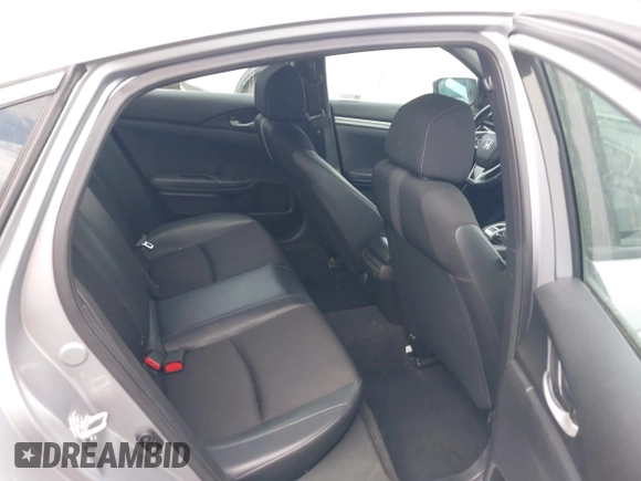2021 Honda Civic Sport with VIN 2HGFC2F88MH530214, listed as a IAAI auction lot 41968361 with 60,869 mi miles and . Bid and sale history available at DreamBid. Image 8.