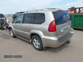 2003 Lexus GX 470 z VIN JTJBT20X930014196, wystawiony jako IAAI lot #42467486 z przebiegiem 282 962 mil mil oraz . Historia ofert i sprzedaży dostępna na DreamBid. Obrazek 3.