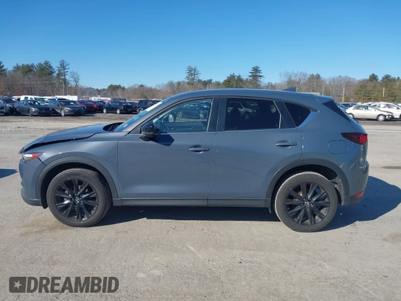 2021 Mazda CX-5 Touring with VIN JM3KFBCM0M0489644, listed as a IAAI auction lot 41756117 with 67,365 mi miles. Bid and sale history available at carsss.com. Image 14.