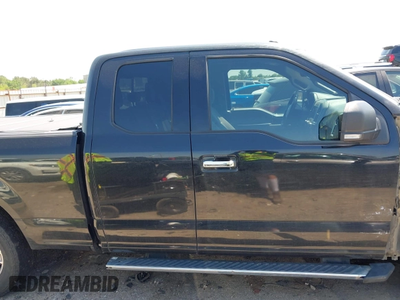 2015 Ford F-150 XL with VIN 1FTEX1CF7FKF12438, listed as a IAAI auction lot 41993076 with 141,785 mi miles and . Bid and sale history available at DreamBid. Image 14.