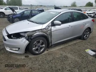 2018 Ford Focus SE z VIN 1FADP3FE5JL211962, wystawiony jako Copart lot #57121795 z przebiegiem 108 643 mil mil oraz Szkoda całkowita • Salvage title. Historia ofert i sprzedaży dostępna na DreamBid. Obrazek 1.