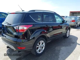 2017 Ford Escape SE with VIN 1FMCU9GD4HUE72510, listed as a IAAI auction lot 41932364 with 115,991 mi miles. Bid and sale history available at carsss.com. Image 4.