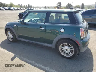 2009 MINI Hardtop S with VIN WMWMF73539TW85698, listed as a Copart auction lot 54957685 with 98,429 mi miles and Clean Title. Bid and sale history available at DreamBid. Image 2.