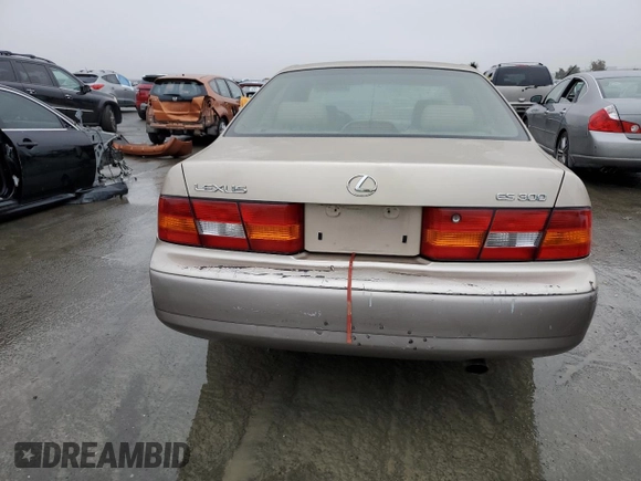 1999 Lexus ES 300 Luxury Sport Sdn with VIN JT8BF28G6X0170859, listed as a Copart auction lot 86406124 with 0 mi miles and Salvage Title. Bid and sale history available at carsss.com. Image 6.