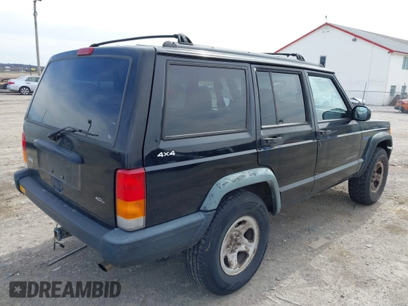 1998 Jeep Cherokee Sport with VIN 1J4FJ68S3WL285200, listed as a IAAI auction lot 41834529 with 335,881 mi miles and . Bid and sale history available at DreamBid. Image 4.