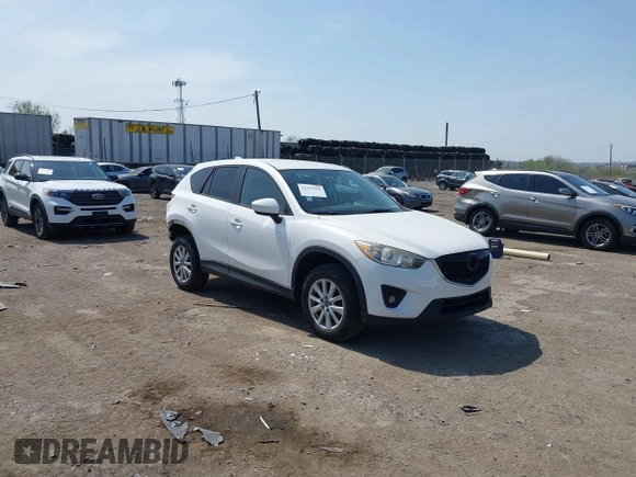 2013 Mazda CX-5 Touring with VIN JM3KE4CE1D0136241, listed as a IAAI auction lot 42119260 with 106,913 mi miles and . Bid and sale history available at carsss.com. Image 1.