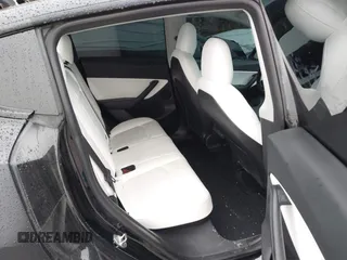 2022 Tesla Model Y Performance z VIN 7SAYGDEF4NF350696, wystawiony jako IAAI lot #41662924 z przebiegiem 36 747 mil mil oraz . Historia ofert i sprzedaży dostępna na DreamBid. Obrazek 8.