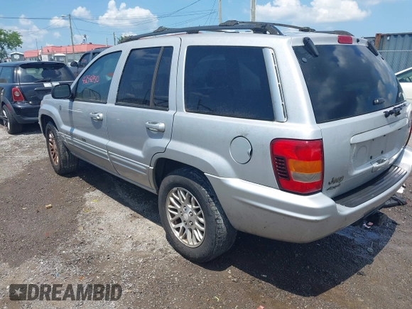 2004 Jeep Grand Cherokee Limited with VIN 1J4GW58N64C283657, listed as a IAAI auction lot 42542150 with 228,910 mi miles and . Bid and sale history available at DreamBid. Image 3.