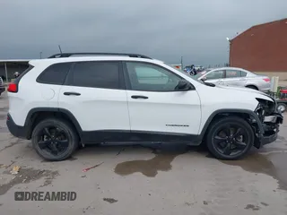 2016 Jeep Cherokee Altitude with VIN 1C4PJLAB2GW346507, listed as a IAAI auction lot 41924540 with 89,235 mi miles and . Bid and sale history available at DreamBid. Image 14.