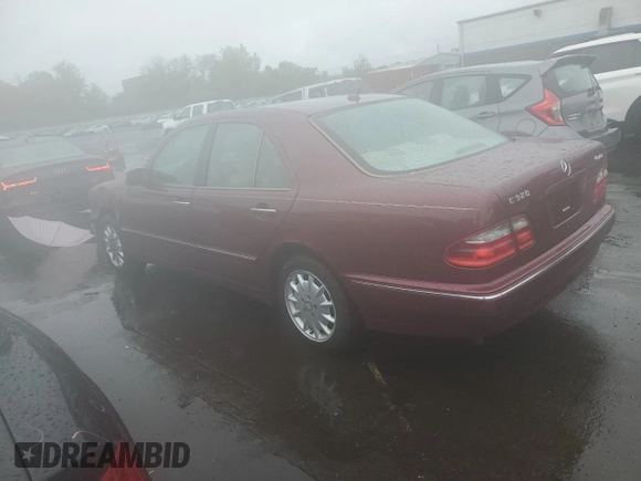 2002 Mercedes-Benz E 320 with VIN WDBJF82J22X070566, listed as a Copart auction lot 55964535 with 238,240 mi miles and Salvage Title. Bid and sale history available at DreamBid. Image 2.