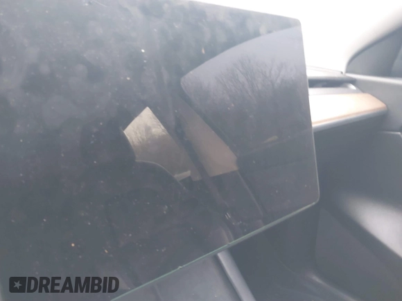 2022 Tesla Model Y Long Range z VIN 7SAYGDEE9NF331410, wystawiony jako IAAI lot #41580172 z przebiegiem 81 794 mil mil oraz . Historia ofert i sprzedaży dostępna na DreamBid. Obrazek 15.
