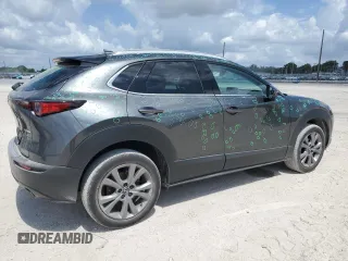 2024 Mazda CX-30 S Premium z VIN 3MVDMBDM4RM615609, wystawiony jako Copart lot #57761055 z przebiegiem 20 721 mil mil oraz Szkoda całkowita • Salvage title. Historia ofert i sprzedaży dostępna na DreamBid. Obrazek 3.