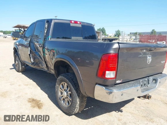 2015 Ram 2500 Laramie z VIN 3C6UR5FL6FG708769, wystawiony jako IAAI lot #42299173 z przebiegiem 101 660 mil mil oraz . Historia ofert i sprzedaży dostępna na DreamBid. Obrazek 3.