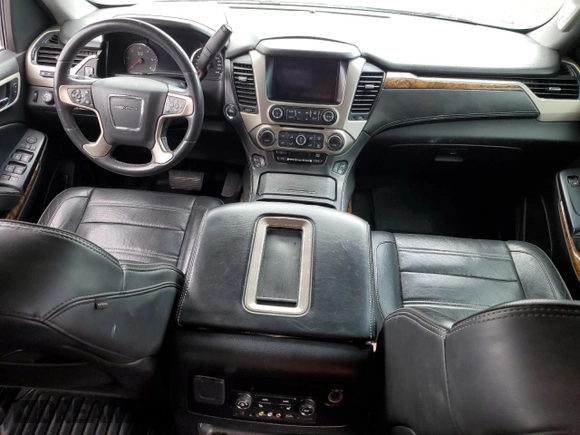 2015 GMC Yukon Denali with VIN 1GKS1CKJ0FR140877, listed as a Copart auction lot 50917985 with 180,726 mi miles and Salvage Title. Bid and sale history available at carsss.com. Image 8.
