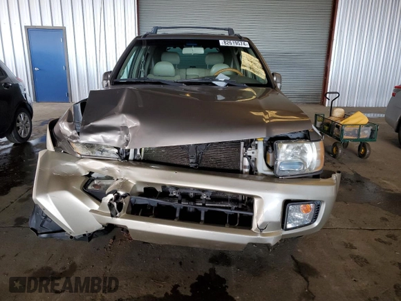 2001 Infiniti QX4 with VIN JNRDR09X21W204448, listed as a Copart auction lot 82619574 with 114,520 mi miles and Salvage Title. Bid and sale history available at DreamBid. Image 5.