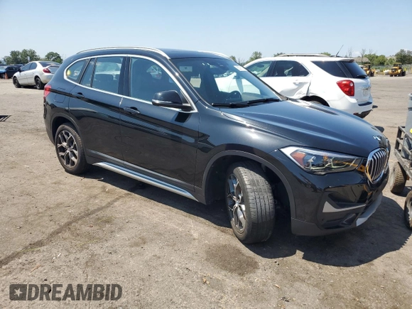 2021 BMW X1 xDrive28i with VIN WBXJG9C06M5S33201, listed as a Copart auction lot 66391015 with 53,395 mi miles and Salvage title. Bid and sale history available at DreamBid. Image 4.
