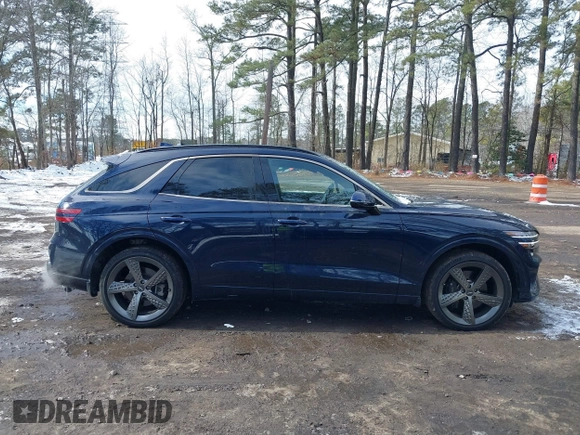 2022 Genesis GV70 Sport z VIN KMUMCDTC3NU074029, wystawiony jako IAAI lot #41400987 z przebiegiem 29 494 mil mil oraz . Historia ofert i sprzedaży dostępna na DreamBid. Obrazek 13.