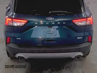 2020 Ford Escape SE with VIN 1FMCU9G65LUB80892, listed as a IAAI auction lot 42715723 with 86,362 mi miles and . Bid and sale history available at DreamBid. Image 2.