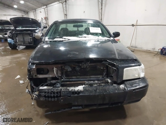 2009 Mercury Grand Marquis LS with VIN 2MEHM75V39X602084, listed as a IAAI auction lot 41615859 with 102,051 mi miles. Bid and sale history available at carsss.com. Image 12.