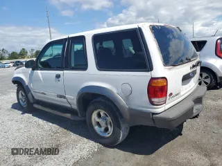 1998 Ford Explorer Sport with VIN 1FMYU22X9WUC05410, listed as a Copart auction lot 56376265 with 251,401 mi miles and Salvage title. Bid and sale history available at DreamBid. Image 2.