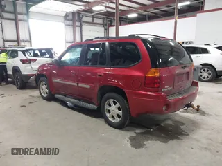 2003 GMC Envoy SLT with VIN 1GKDT13SX32134944, listed as a IAAI auction lot 41498519 with 149,640 mi miles. Bid and sale history available at carsss.com. Image 3.