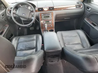2008 Ford Taurus Limited with VIN 1FAHP28W38G117020, listed as a Copart auction lot 76197234 with 112,027 mi miles and Salvage Title. Bid and sale history available at carsss.com. Image 9.