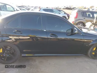 2009 Mercedes-Benz C 63 AMG with VIN WDDGF77X39F231287, listed as a IAAI auction lot 41556195 with 173,471 mi miles and . Bid and sale history available at DreamBid. Image 14.