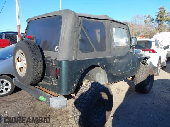 2005 Jeep Wrangler SE with VIN 1J4FA29155P366432, listed as a IAAI auction lot 41260303 with 134,021 mi miles. Bid and sale history available at carsss.com. Image 4.