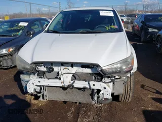 2012 Mitsubishi Outlander Sport SE with VIN JA4AP4AU8CZ000170, listed as a IAAI auction lot 41636634 with 182,664 mi miles. Bid and sale history available at carsss.com. Image 13.