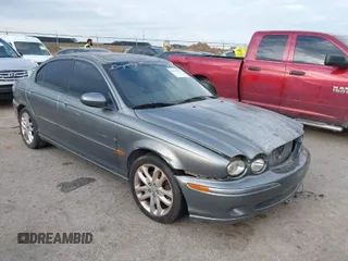 2002 Jaguar X-Type Sport z VIN SAJEA53D92XC47708, wystawiony jako IAAI lot #41871079 z przebiegiem 188 937 mil mil oraz . Historia ofert i sprzedaży dostępna na DreamBid. Obrazek 1.