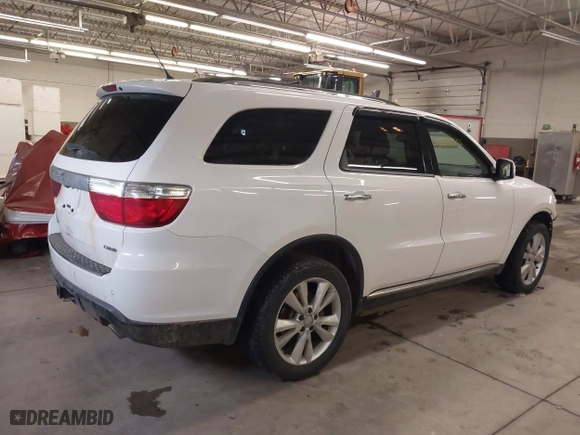 2013 Dodge Durango Crew with VIN 1C4SDJDT1DC540680, listed as a IAAI auction lot 41649262 with 106,016 mi miles. Bid and sale history available at carsss.com. Image 4.